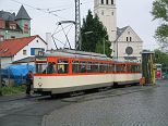 L-Triebwagen 124 und Beiwagen 1242 auf Sonderfahrt in der Schleife Nied Kirche am 27.04.2003